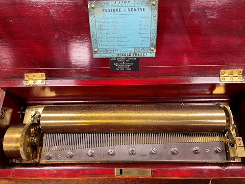 Lot 587 - A walnut musical box by Nicole Freres, Geneva, 19th century