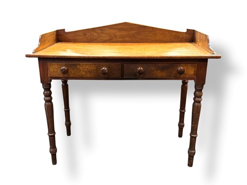 Lot 580 - A 19th century mahogany washstand with shaped...