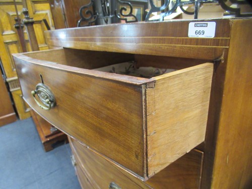 Lot 669 - A Regency mahogany bow front chest of drawers,...