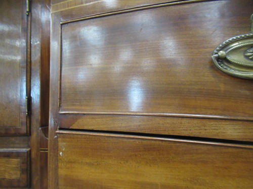 Lot 669 - A Regency mahogany bow front chest of drawers,...