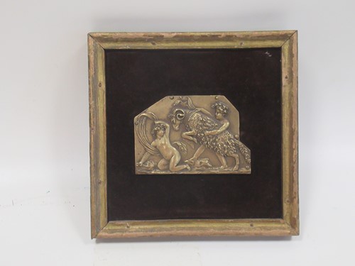 Lot 140 - A 20th century framed decorative brass plaque...