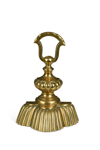 Lot 477 - A brass doorstop, late 19th century