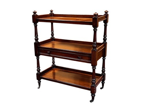Lot 659 - A Victorian three tier mahogany buffet, with...