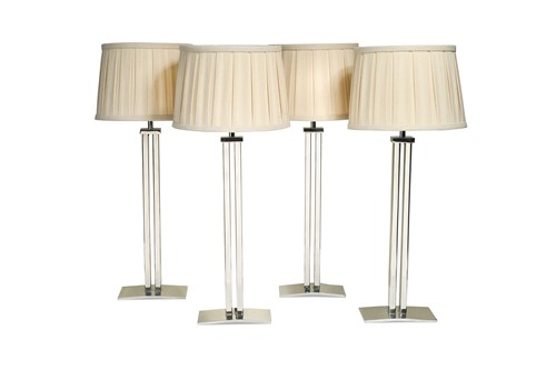 Lot 615 - A set of four contemporary chrome table lamps