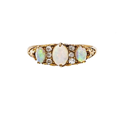 Lot 51 - An opal and diamond carved half hoop ring