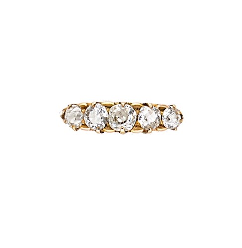 Lot 80 - A diamond set carved half hoop style ring