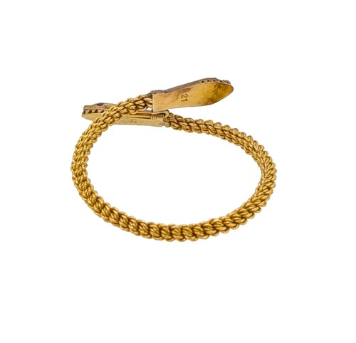 Lot 130 - A diamond set serpent bangle