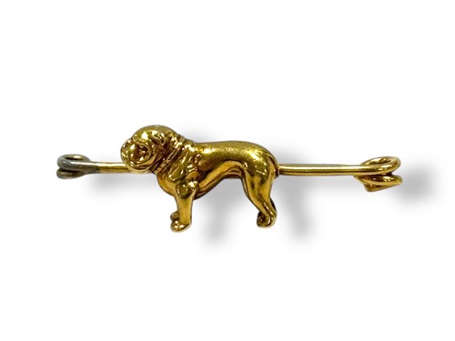 Lot 282 - A bulldog brooch, stock pin style brooch...