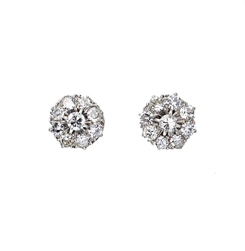 Lot 162 - A pair of mid 20th century diamond cluster ear studs