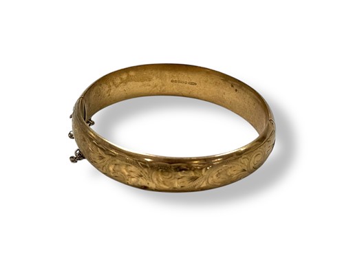 Lot 267 - A hallmarked 9ct gold bangle, weight 14.1g