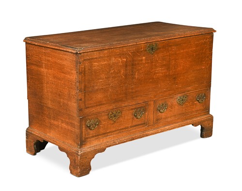 Lot 427 - A George III oak mule chest