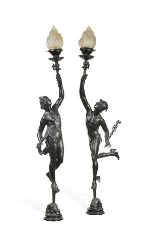 Lot 534 - A pair of cast metal newel post stair lamps after Giambologna, circa 1900