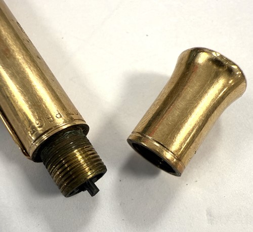 Lot 325 - A 9ct gold gravity fed propelling pencil, mark of Sampson Mordan, along with another