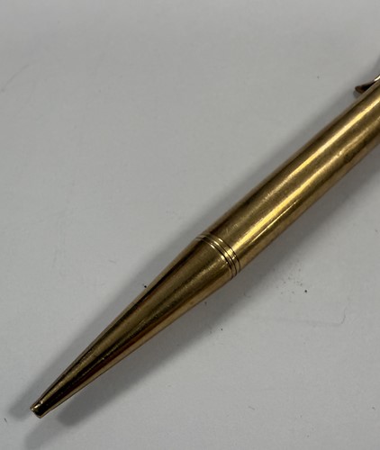 Lot 325 - A 9ct gold gravity fed propelling pencil, mark of Sampson Mordan, along with another