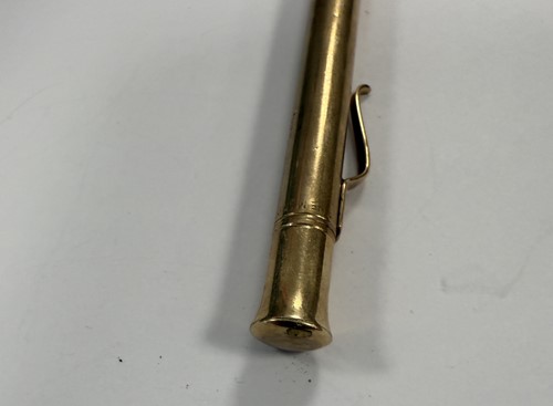 Lot 325 - A 9ct gold gravity fed propelling pencil, mark of Sampson Mordan, along with another