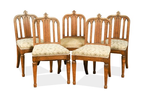 Lot 578 - A set of five Gothic style oak chairs, 19th century