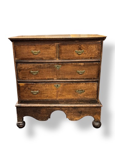 Lot 553 - An 18th century oak chest of drawers on stand,...