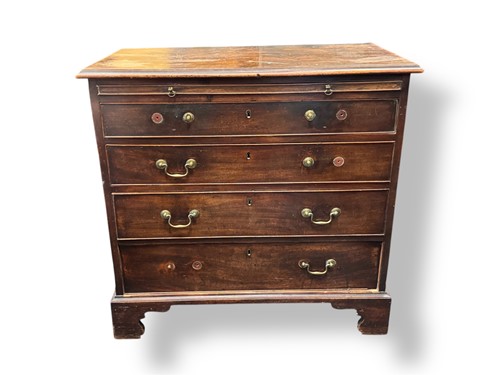 Lot 563 - A George III mahogany chest of drawers with...