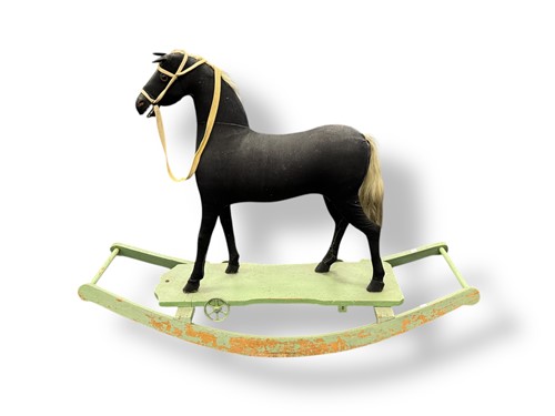 Lot 588 - An Edwardian rocking horse, later fixed to a...