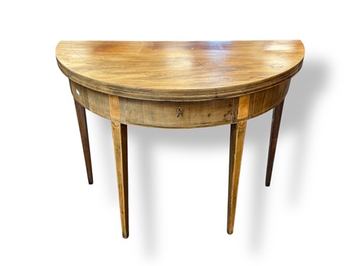 Lot 598 - An early 19th century faded mahogany foldover...