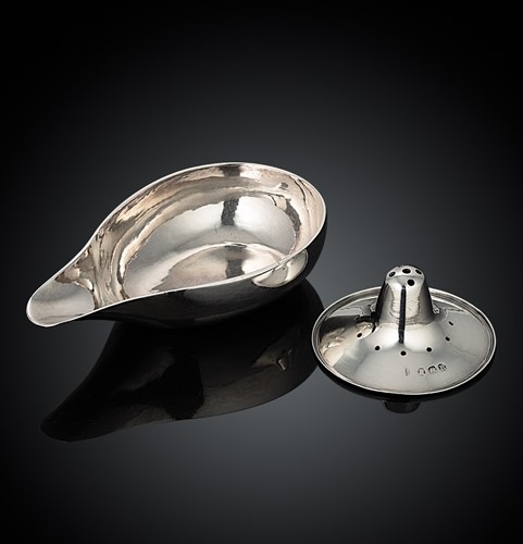 Lot 281 - A George III silver nipple shield and earlier pap boat