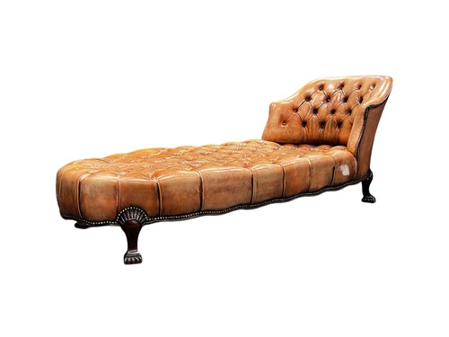 Lot 660 - A Victorian leather upholstered day bed, with...