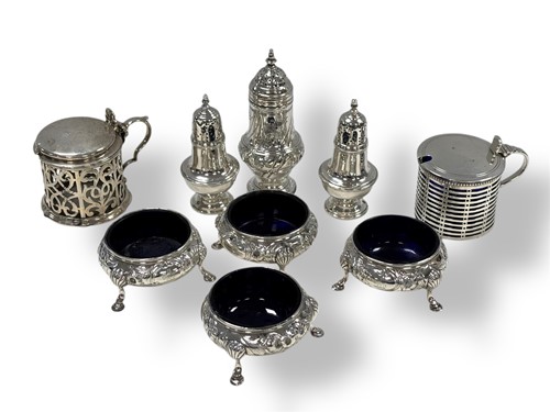 Lot 241 - A collection of silver cruets including three...