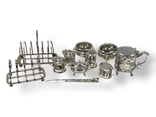 Lot 246 - A collection of silverware including cruets,...