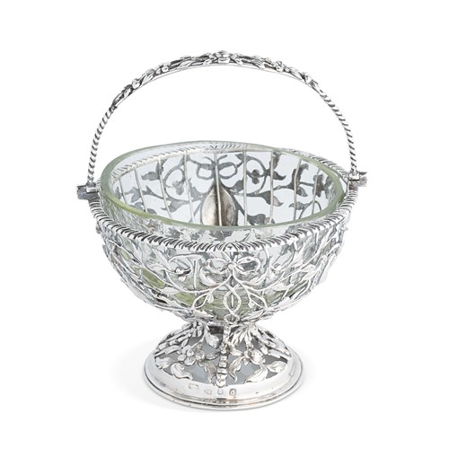 Lot 430 - A George III 18th century silver swing handled sugar basket