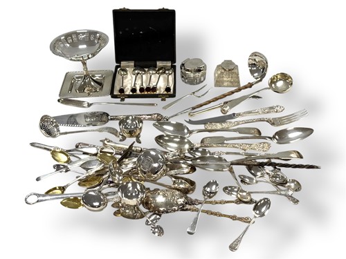 Lot 243 - A collection of silverware including flatware,...