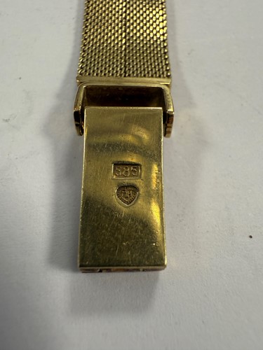 Lot 256 - Mido Watch Cie., - A Swiss 14ct gold 'Lido' wristwatch