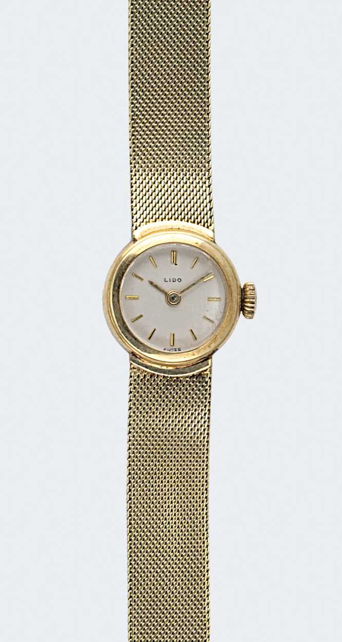 Lot 256 - Mido Watch Cie., - A Swiss 14ct gold 'Lido' wristwatch