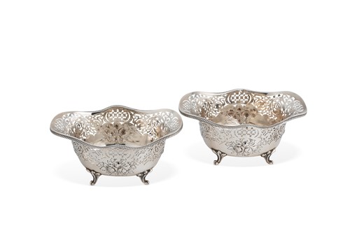 Lot 502 - A pair of Edward VII silver pierced bonbon dishes