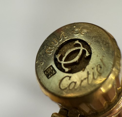 Lot 301 - Cartier - A 'Les Must De Cartier Trinity' fountain pen, together with a Tiffany letter opener