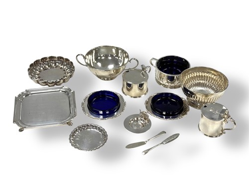 Lot 237 - A collection of silverware including mustards,...