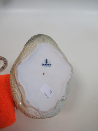 Lot 5 - A Lladro model of a tiger and one of a duck