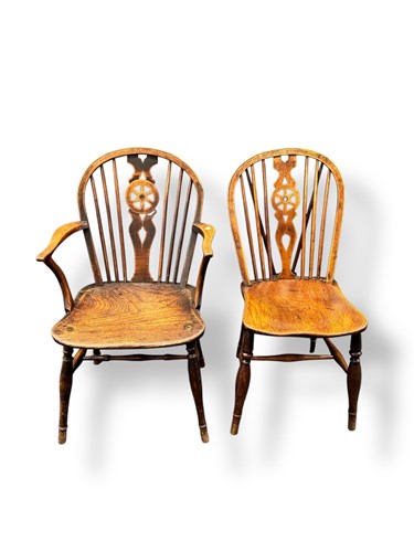 Lot 558 - Six Windsor chairs with hooped wheel backs and...