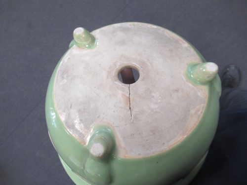 Lot 11 - An Oriental 'celadon' type glazed jardiniere...