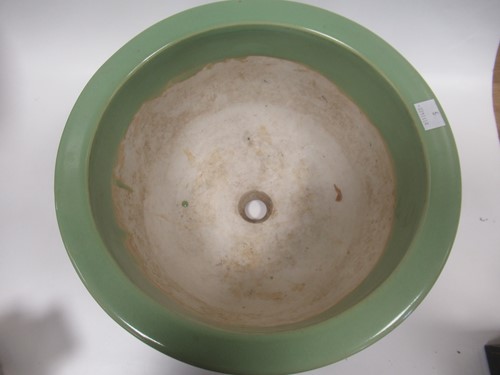 Lot 11 - An Oriental 'celadon' type glazed jardiniere...