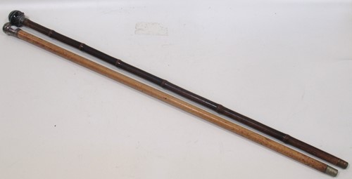Lot 144 - A walking stick with silver mount by Brigg and...