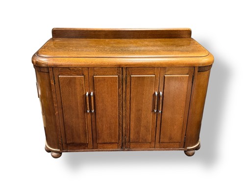 Lot 541 - A 1930's Art Deco oak sideboard by Ernst Gomme...