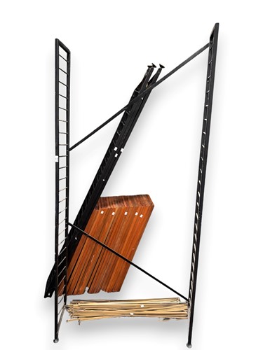 Lot 627 - Ladderax teak and black metal framed...
