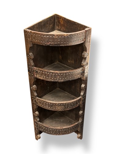 Lot 326 - An Anglo-Indian carved hardwood corner shelf, 19th century