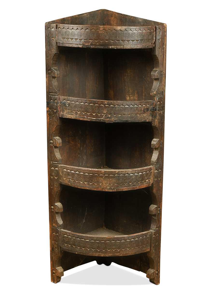 Lot 326 - An Anglo-Indian carved hardwood corner shelf, 19th century