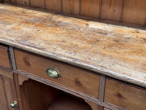 Lot 644 - A Victorian and later pine dresser, the...