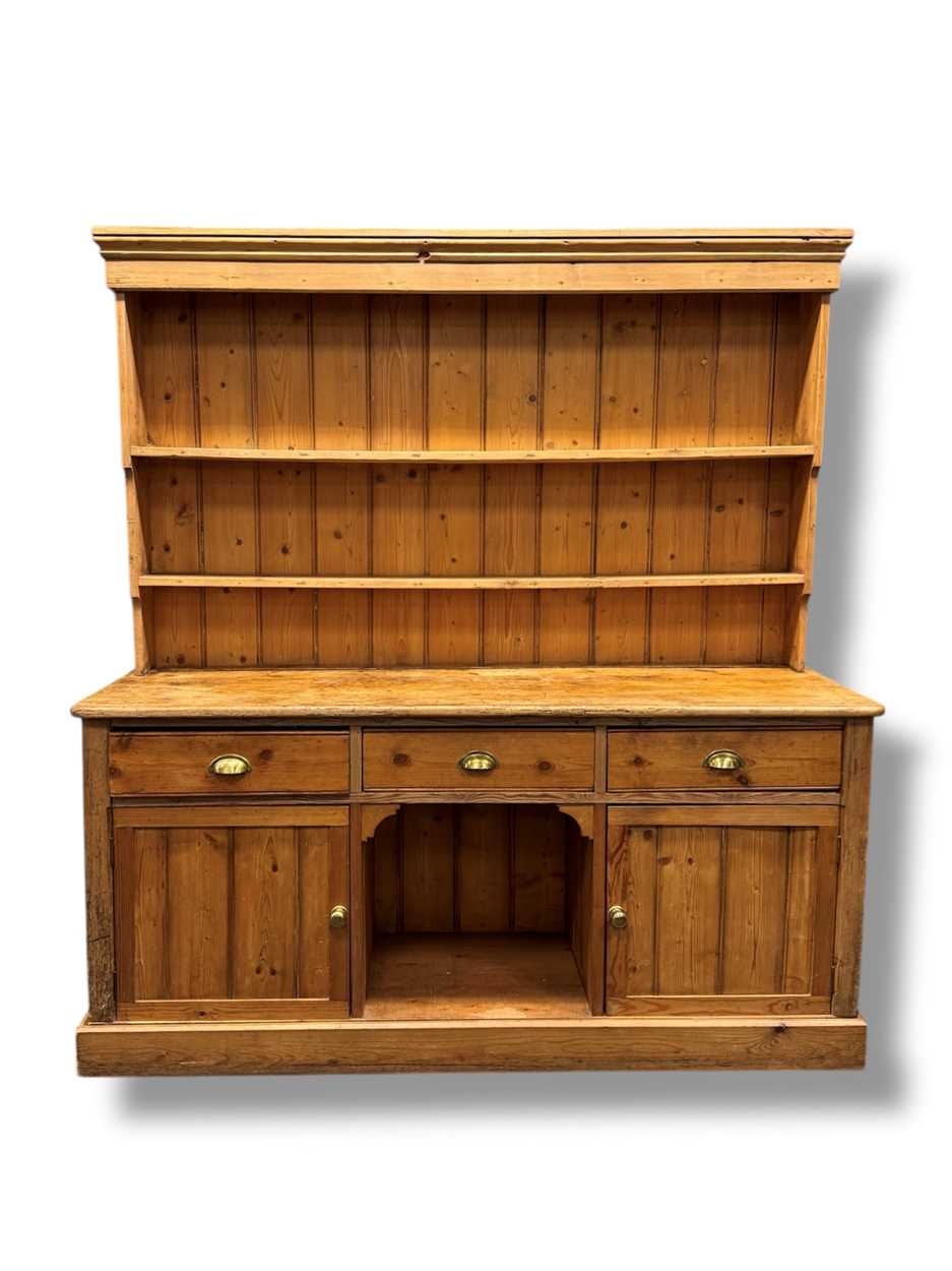 Lot 644 - A Victorian and later pine dresser, the...