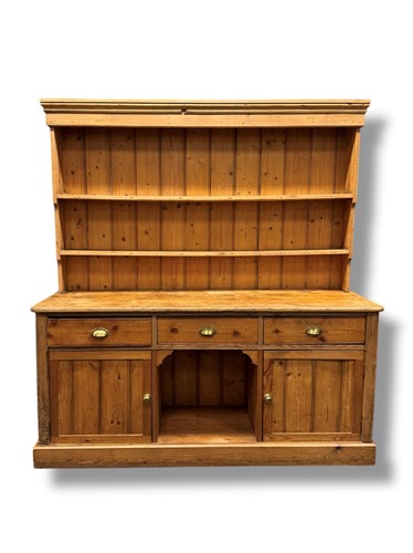 Lot 644 - A Victorian and later pine dresser, the...