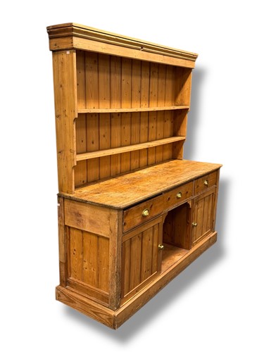 Lot 644 - A Victorian and later pine dresser, the...