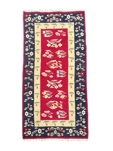 Lot 671 - Two decorative cotton flatweave rugs decorated...