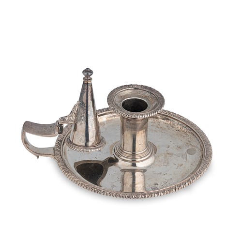 Lot 446 - A George III silver chamberstick